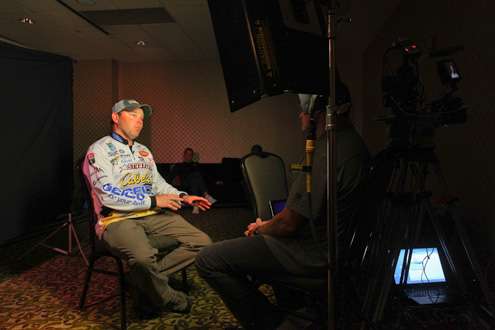 <p>One of the pre-tournament favorites, Mike McClelland does a Bassmaster television interview.</p>
