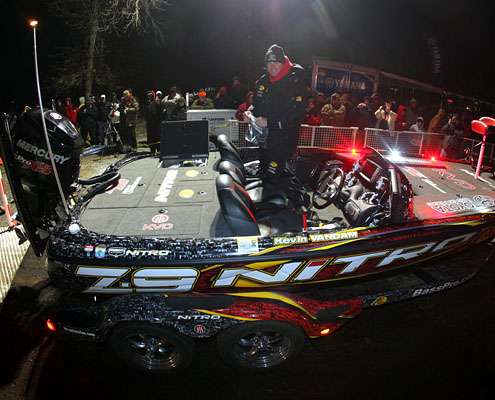 Kevin VanDam launches his boat in front of a crowd that grew into the thousands Friday morning.
