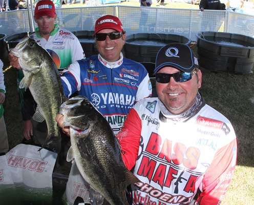 <p>Greg Hackney and Dean Rojas show off their big fish before hitting the stage.</p>
