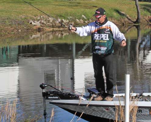 <p>He doesn't last long with the spinning rod, before he's back to flipping.</p>
