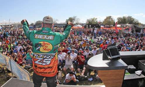 <p>Dennis Tietje holds up his best fish in front of a home crowd Friday.</p>
