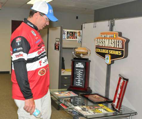 <p>Pace checks out the area dedicated to the Carhartt Bassmaster College Series.</p>
