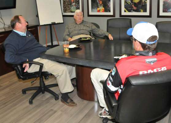 <p>Bruce Akin, Don Logan and Cliff Pace sit around talking fishing before Pace departs for Little Rock.</p>
