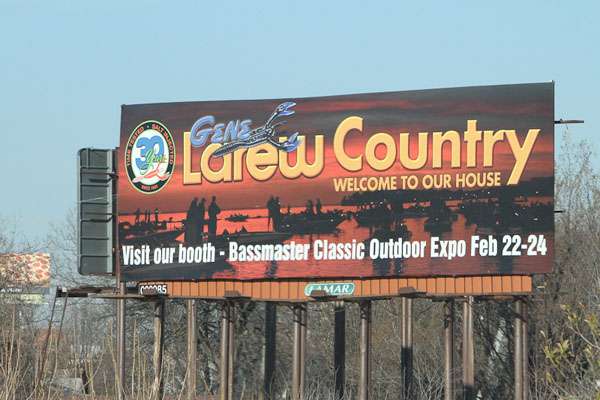 Tulsa luremaker Gene Larew bought billboard time and combined with Legend Boats, Honda Outboards and country music station 98.5 KVOO to give away a boat at the Expo for the closest to guess how many Gene Larew/Bobby Garland baits were in a 10-gallon aquarium at their booth at the Bassmaster Classic Expo. 