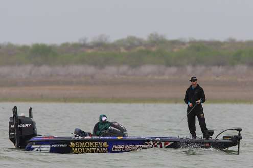 <p>Josh Bertrand is working his way into the waves on Day One. The wind is increasing as the overcast sky continues.  </p>
