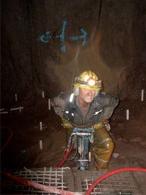 <p>What other sport would take you from this...working in a mine 7,000 feet below ground...</p>
