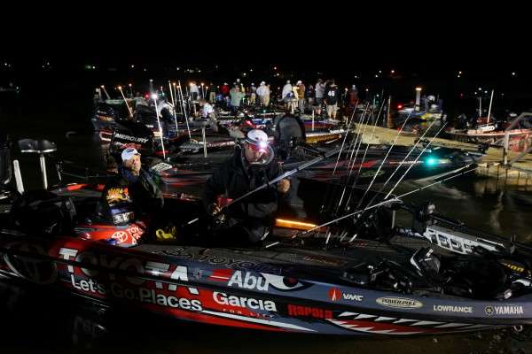 <p>Iaconelli checks his rods. He spent most of his time looking over his gear instead of talking to other anglers.</p>
