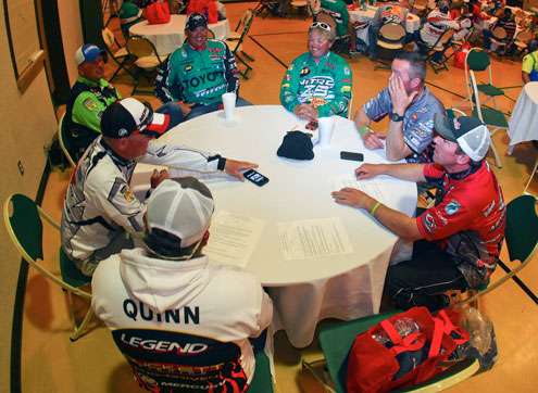 <p>Anglers gathered at tables and visited before being paired with their Day One Marshals. </p>
