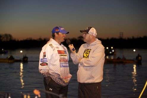 Bassmaster emcee Dave Mercer interviews Cliff Crochet, who is in third place with 13-0 after Day One.
