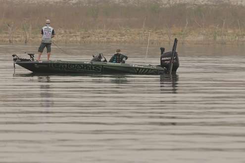 <p>Jonathan VanDam fishes down by a dam.</p>
