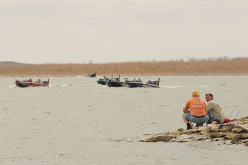 <p>Local fans watch the anglers come back in.</p>
