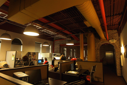 <p>Desk space is sectioned out on the second floor where writers and editors work on a variety of websites including Bassmaster.com.</p>
