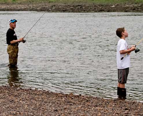 <p> </p>
<p>Brent and Mason Chapman stand near the bank casting to an eddy on the White River.</p>
