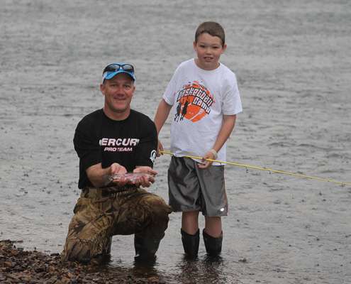 <p> </p>
<p>Then the two pose with the catch right before the rain started.</p>
