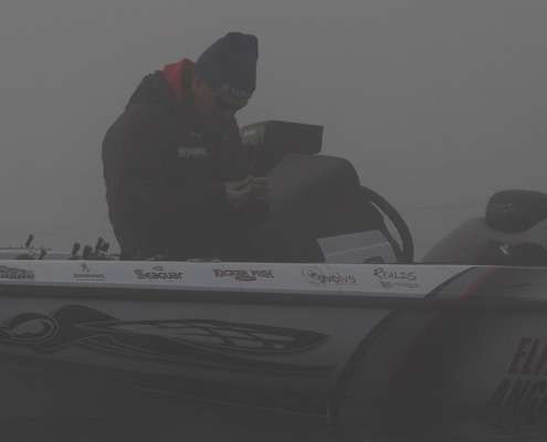 <p> </p>
<p>Saturday morning started with a thick fog and Clark Reehm sitting on a point changing lures.</p>
