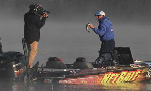 <p> </p>
<p> </p>
<p>Vinson shows it to the Bassmaster TV camera and deposits it into the livewell.</p>

