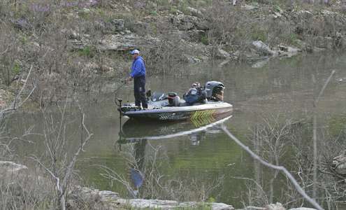 <p>Vinson fishes the back of a creek.</p>
