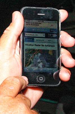 <p>Herren had the Weather Channel displaying on his phone. </p>
