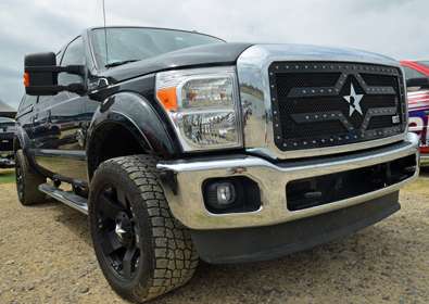 <p>Fred Roumbanis drives a Power Stroke diesel Ford F-250 with custom wheels and grill.</p>

