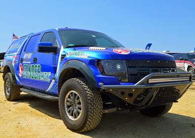 <p>Dean Rojas travels the Elite tour in a Ford F-150 SVT Raptor. Note the Rigid Indistries LED light bar in the grill guard.</p>
