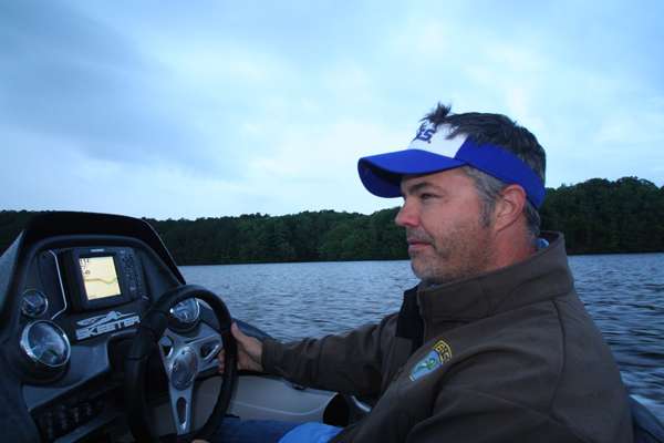 <p>6:50 a.m. Shortly after launching on Lake B, <em>Bassmaster </em>editor James Hall heads uplake to fish a shallow flat.</p>
