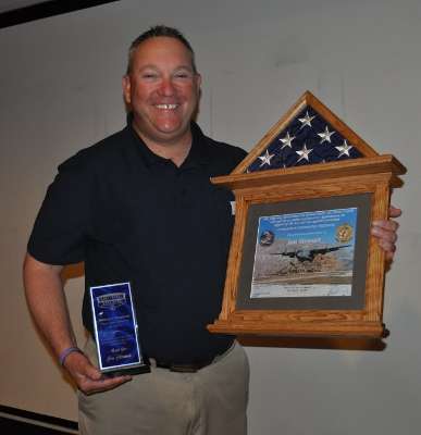 <p>The California B.A.S.S. Nation presented Jon Stewart, B.A.S.S. Nation senior manager, with a plaque for his work with the Nation, as well as a framed flag that was flown over Afghanistan in wartime.</p>
