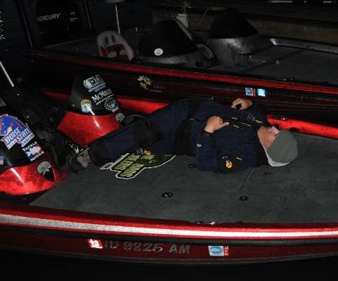 <p>Jared Spickelmier of Idaho stretches on his boat. He's not a morning person, he says.</p>
