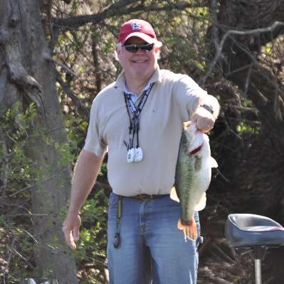 <p>Mark Feldman, a recreational angler who met up with the camera boat earlier in the week during the 2013 Carhartt Bassmaster College Series tournament, shows off his 6-pounder.</p>
