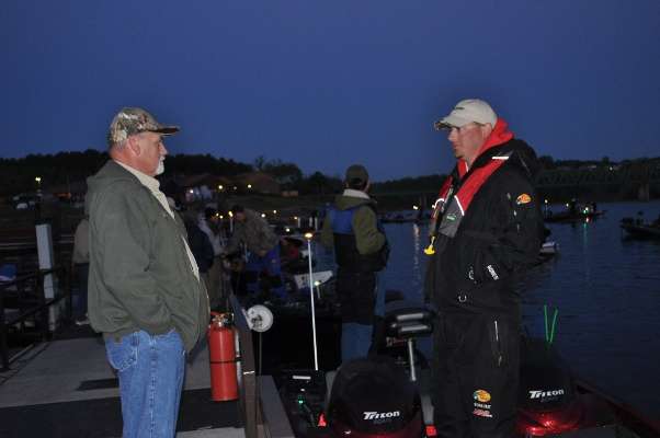 <p> </p>
<p>Patrick Currie, right, talks with his uncle before launch.</p>
