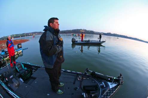 <p> </p>
<p>Chris Lane stands as the National Anthem plays before the start of the final day of fishing on Douglas Lake. </p>
