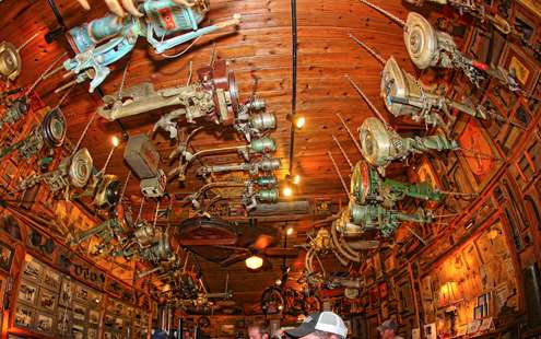 <p>Antique outboard motors hang on the ceiling at Gastonâs Restaurant. </p>
