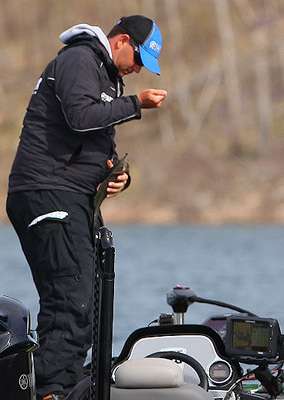 <p>Pace gains control over the bass before releasing it back into Bull Shoals. </p>
