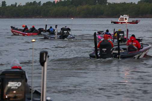 Competitors idle past the BoatUS tow vessel offering rescue services to all of the Bassmaster Open anglers.