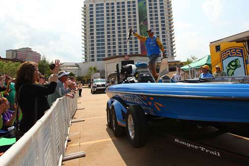 <p> </p>
<p>Wesley Strader shows the crowd one of the bass that helped move to a second-place finish on the final day of fishing on the Red River.</p>
