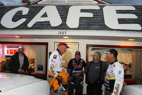 <p>Elite Series pros Dave Smith, Tommy Biffle and David Walker exit a local cafe after enjoying a quick breakfast Thursday.</p>
