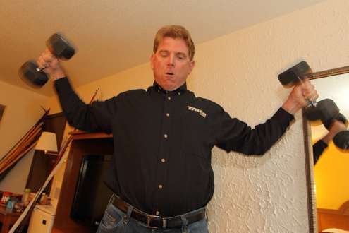 <p>Elite Series pro Rick Morris lifts weights back at the hotel.</p>
