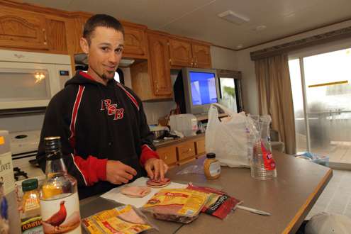 John Crews was making sandwiches for himself and roommate Ish Monroe.