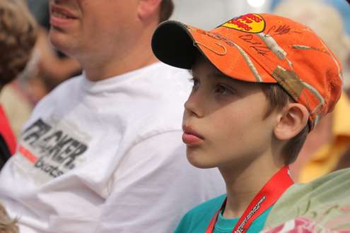 <p>A young fan with an autographed cap.</p>
