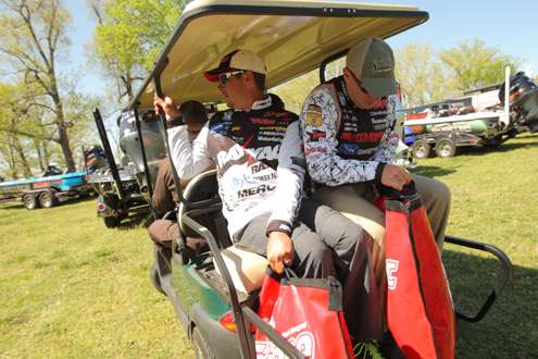 <p>Jason Christie and Andy Montgomery are on a golf cart to get to the weigh-in.</p>
