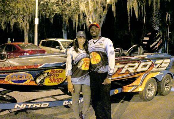 Newson and his wife, Tiffany, pose in front of the Nitro Z-9 that Newson is fishing from this season. 