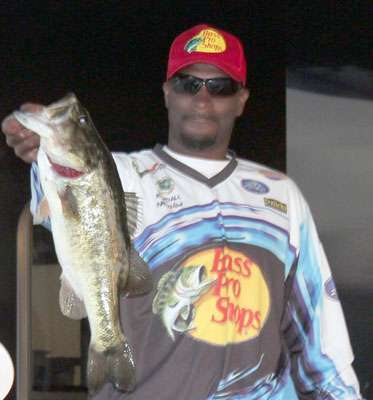 Newson with a nice bass he caught while fishing his first Bassmaster Open at Lake Tohopekaliga last January.
