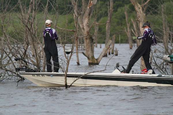 <p>Day One leaders Ben Zuk and Ethan Dhuyvetter from Kansas State start out early along the bank. </p>
