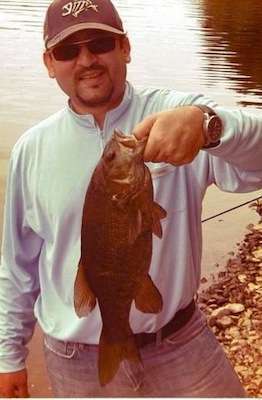 <p>Sawhney's fishing education was slightly interrupted when Walmart transferred him to an office in New York City. But that didn't keep him from pursuing his new hobby, as evidenced by this is a photo of a 4-pound smallmouth he caught in New Jersey. </p>
