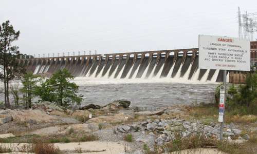 Lake Jordan Dam spills water out into the Coosa River, providing new water for the Elite anglers to fish.
