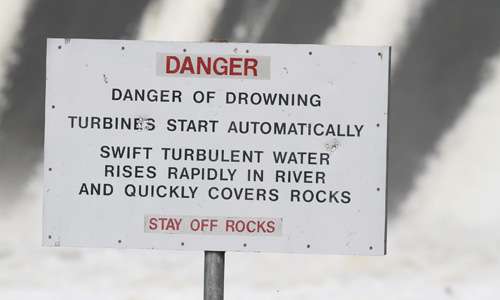 All around the area, signs warn anglers of the dangers.