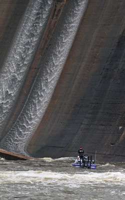 <p>The water coming over the dam is a trickle compared to the day before.</p>
