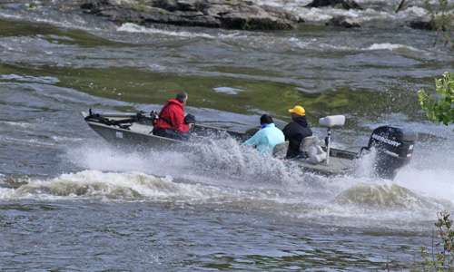 <p>In hot pursuit, Gary Tramontina (in red) and Seigo Saito (in light blue) hit the shoals in a jet boat.</p>

