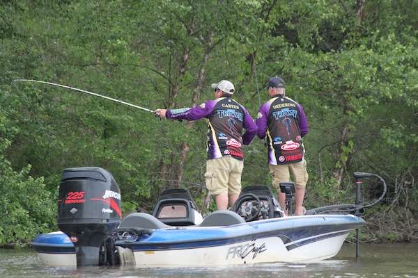 <p>Nick Carter and Leo Dedering of UW Stevens Point pitch their way along a bank. </p>
