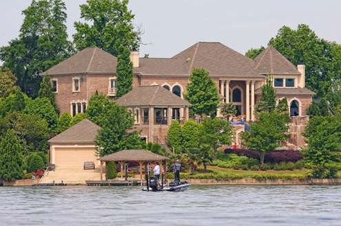 Aaron Martens fishes near one of the many beautiful homes on Logan Martin Lake. 