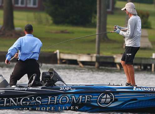 <p>Howell hooks up with a keeper and his co-angler Jeff Ragsdale, grabs the net.</p>
